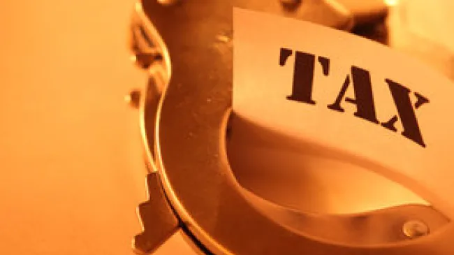 Taxes and handcuffs